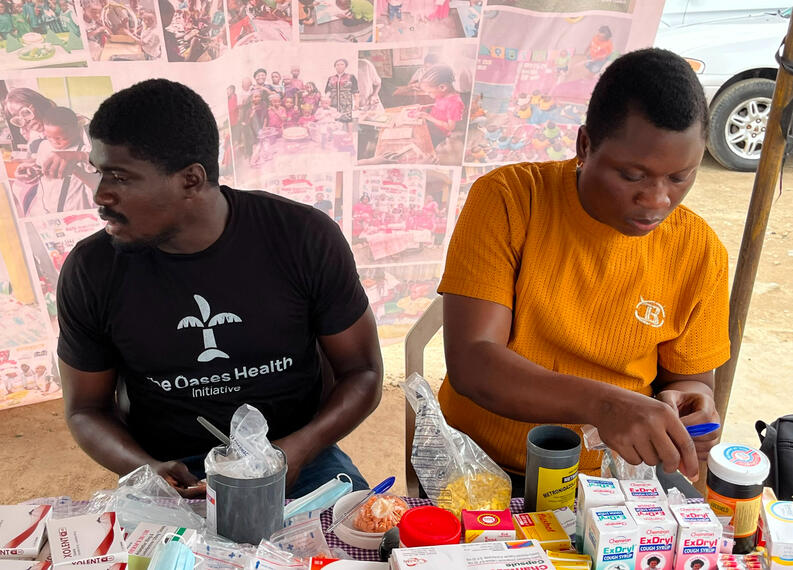 Volunteers at a community sensitization program